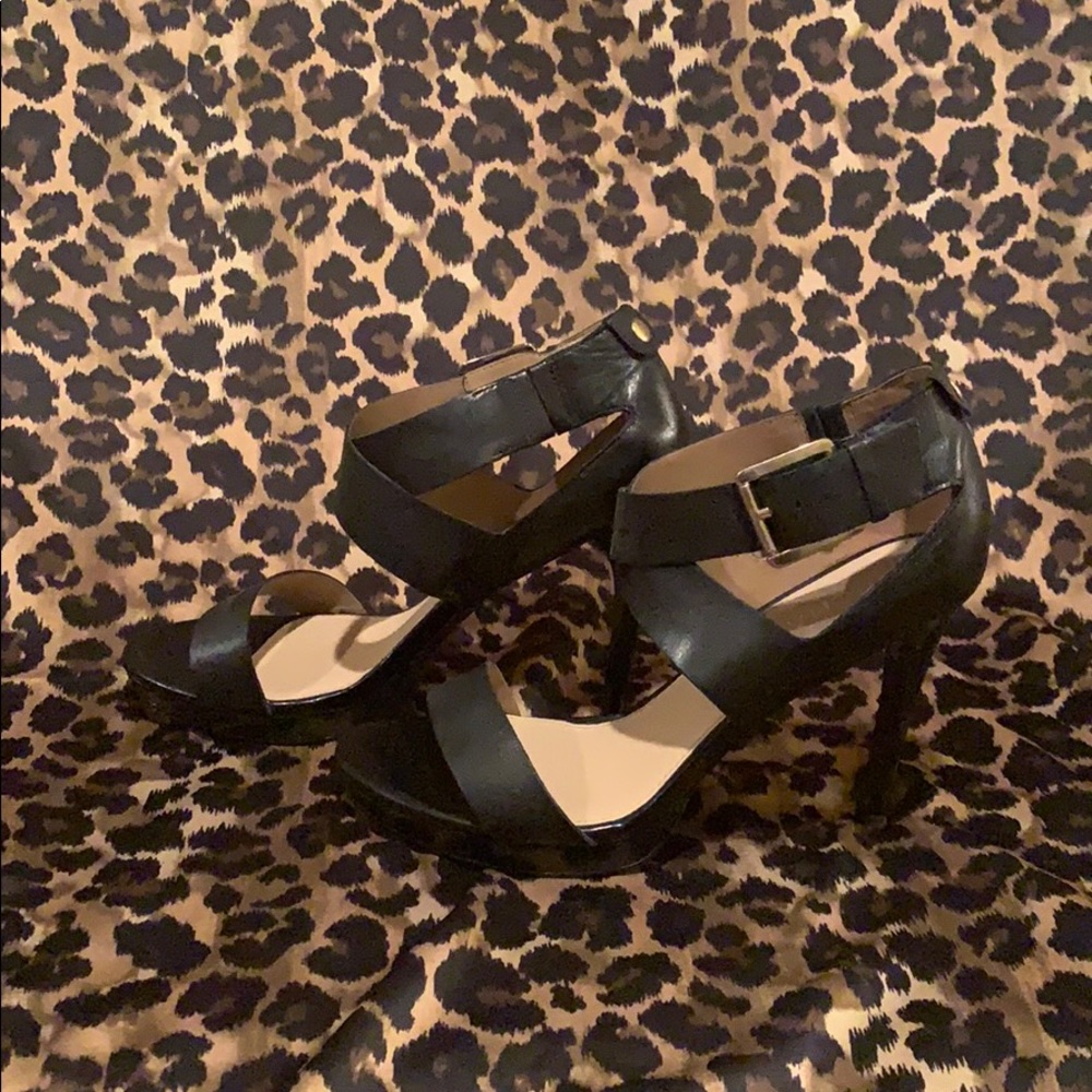 Black leather strappy heels w/ Gold hardware.